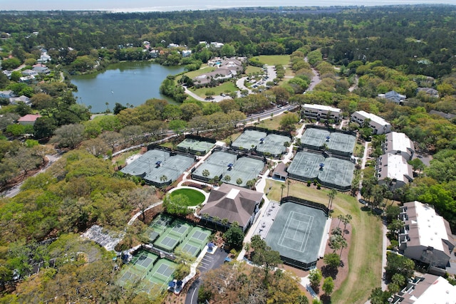 aerial view featuring a water view and a view of trees