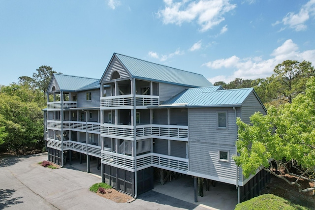 view of property featuring aphalt driveway