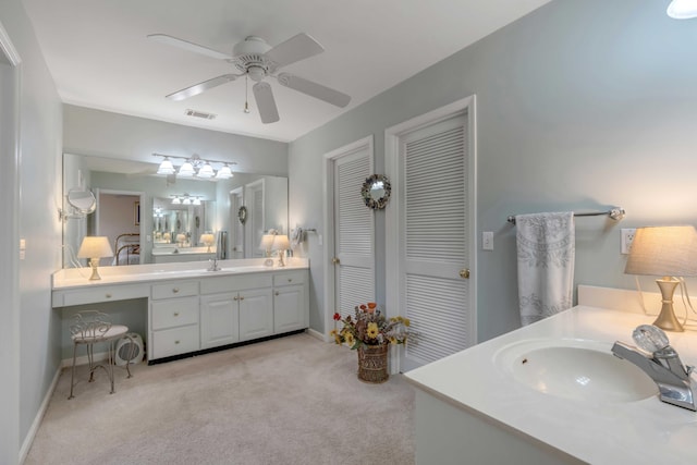 bathroom featuring vanity and ceiling fan