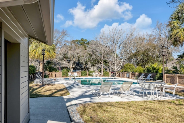 view of pool featuring a patio