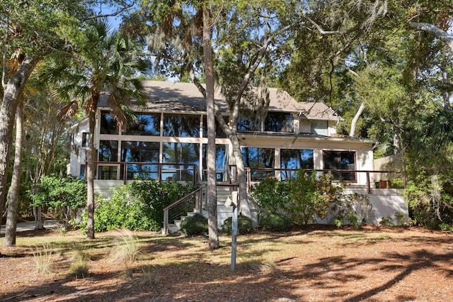 view of front facade featuring a sunroom