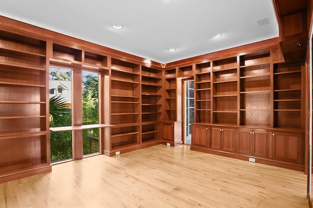 spare room featuring light hardwood / wood-style flooring