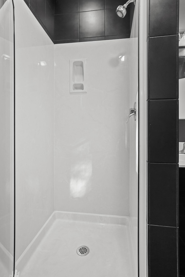 bathroom featuring walk in shower