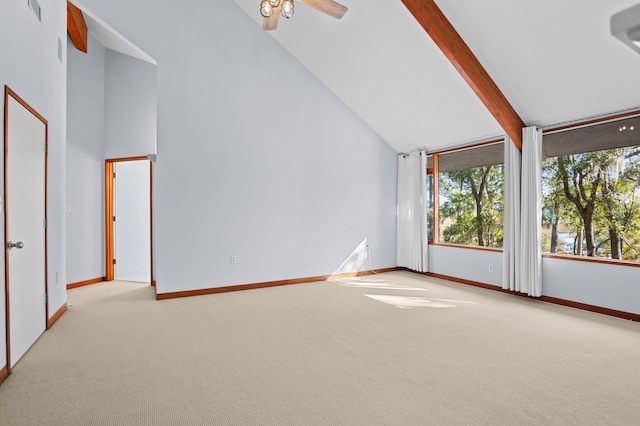 interior space featuring beamed ceiling, ceiling fan, and high vaulted ceiling