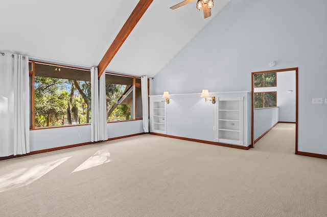 unfurnished living room featuring beam ceiling, light colored carpet, high vaulted ceiling, and ceiling fan