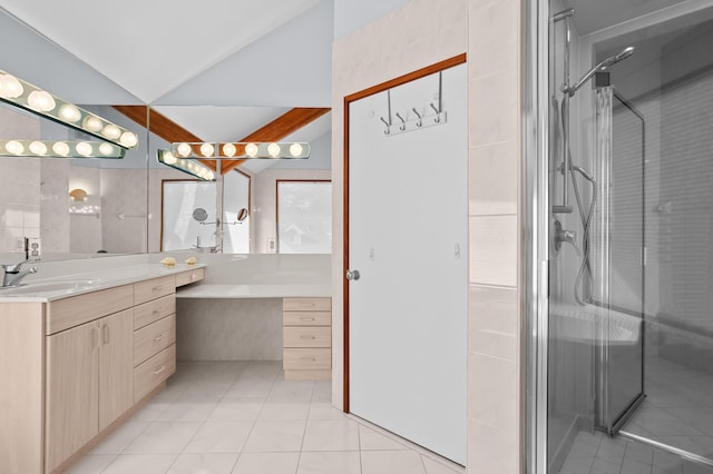 bathroom with tile patterned flooring, vanity, and an enclosed shower