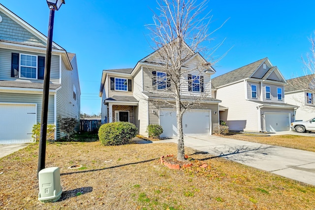 view of front of house with a garage and a front lawn