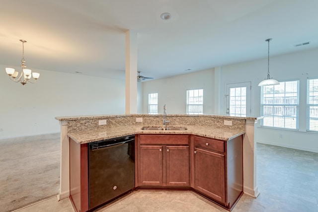 kitchen featuring dishwasher, sink, ceiling fan with notable chandelier, and decorative light fixtures