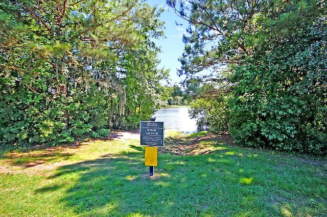 view of yard with a water view