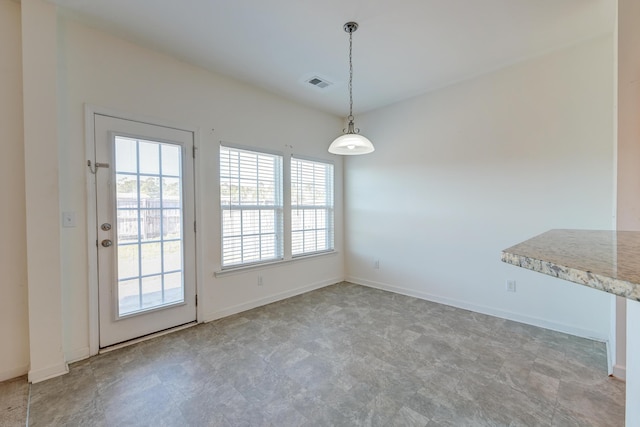 view of unfurnished dining area