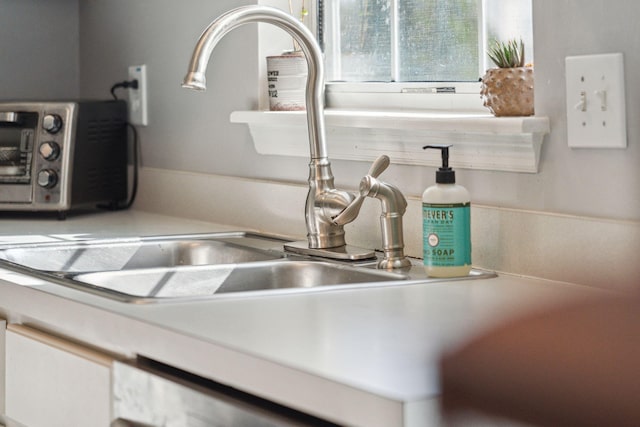 interior details featuring sink