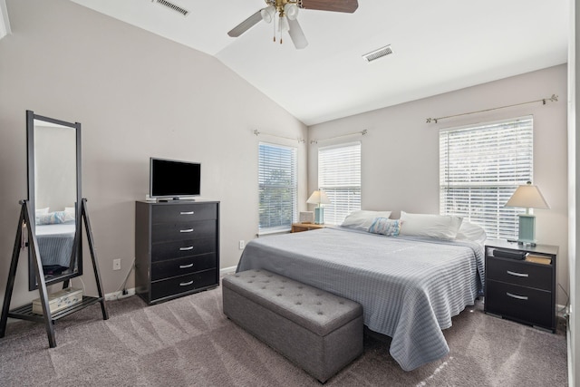 bedroom with carpet floors, ceiling fan, and vaulted ceiling