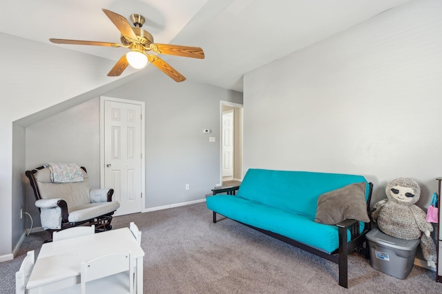 sitting room featuring vaulted ceiling, ceiling fan, and carpet floors