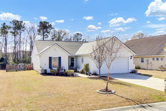 ranch-style home featuring a front yard, concrete driveway, fence, and an attached garage