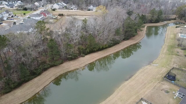 birds eye view of property featuring a residential view and a water view