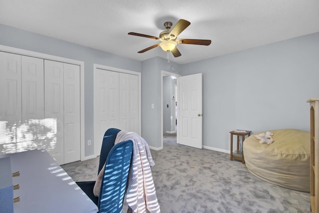 office featuring carpet flooring and ceiling fan