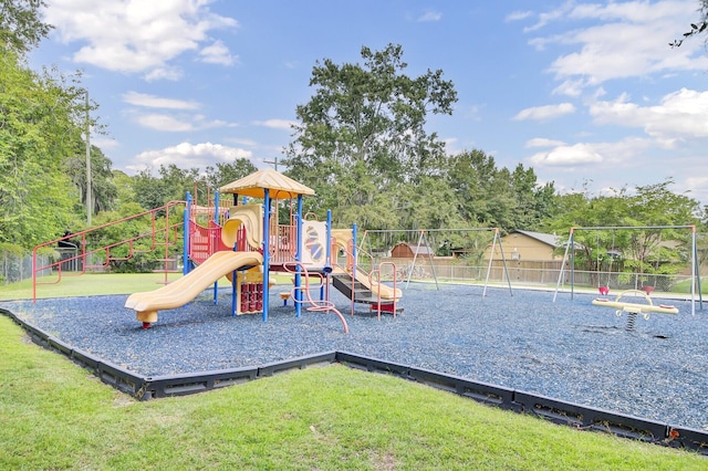 view of jungle gym with a yard