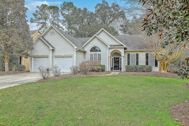 single story home featuring a garage and a front lawn