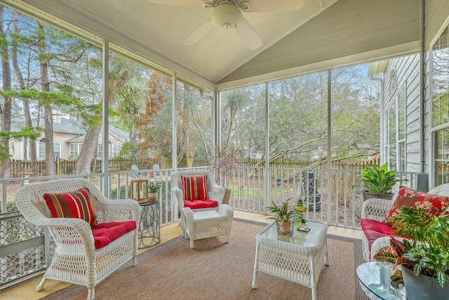 sunroom / solarium with vaulted ceiling and ceiling fan