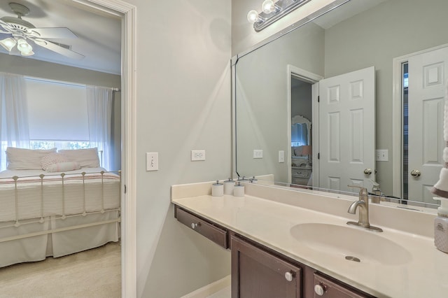 bathroom featuring ceiling fan and vanity