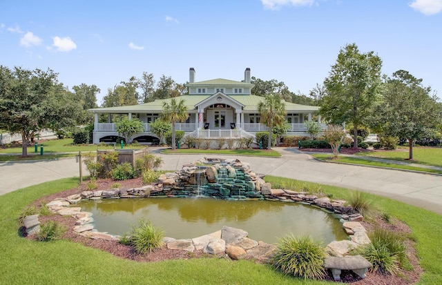 exterior space featuring a small pond