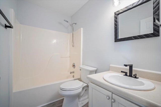 full bathroom with vanity, toilet, and bathtub / shower combination