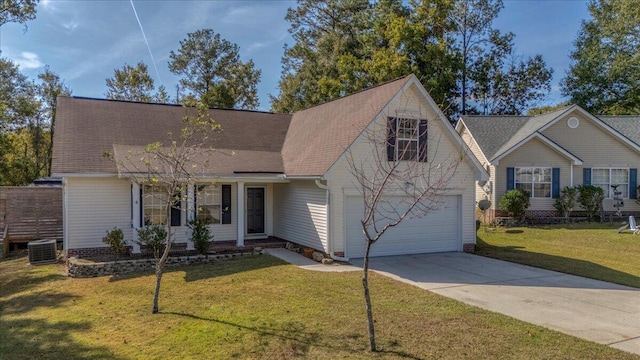 view of front of home featuring central air condition unit, a front yard, and a garage