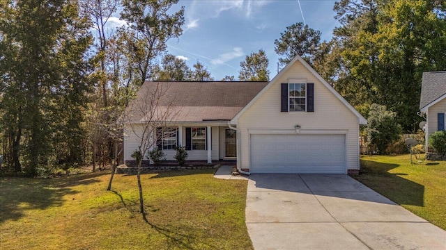 view of front of house with a garage and a front yard