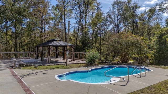 view of pool with a gazebo and a patio area