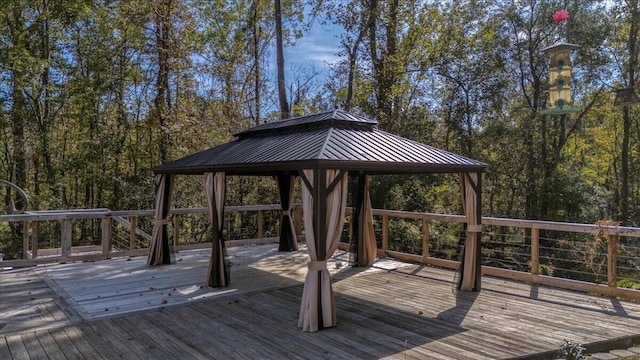 wooden deck featuring a gazebo