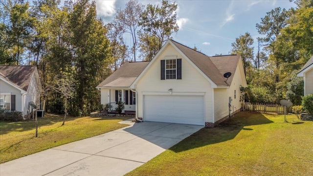 view of front facade featuring a front yard and a garage