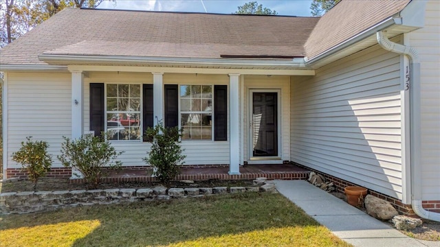 entrance to property with a porch