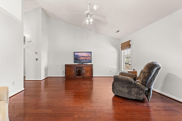 sitting room featuring visible vents, a ceiling fan, wood finished floors, high vaulted ceiling, and baseboards