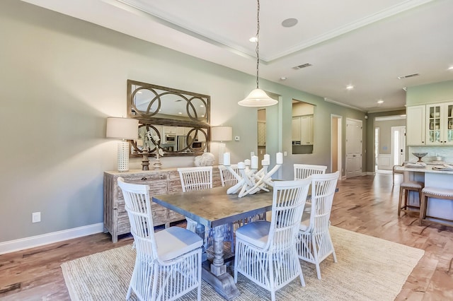 120 Magnolia House Dr, Summerville, SC 29486 - dining area with baseboards, crown molding, light wood finished floors, and recessed lighting