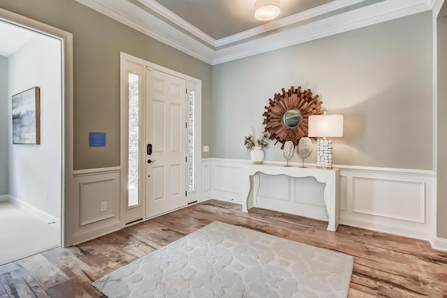 120 Magnolia House Dr, Summerville, SC 29486 - foyer entrance with wood finished floors, ornamental molding, a wainscoted wall, and a decorative wall