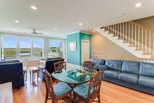 dining space with recessed lighting, baseboards, stairs, ornamental molding, and hardwood / wood-style floors