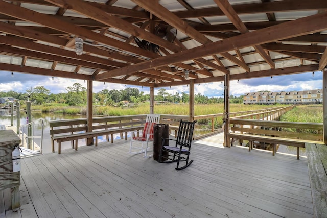 wooden terrace with a water view