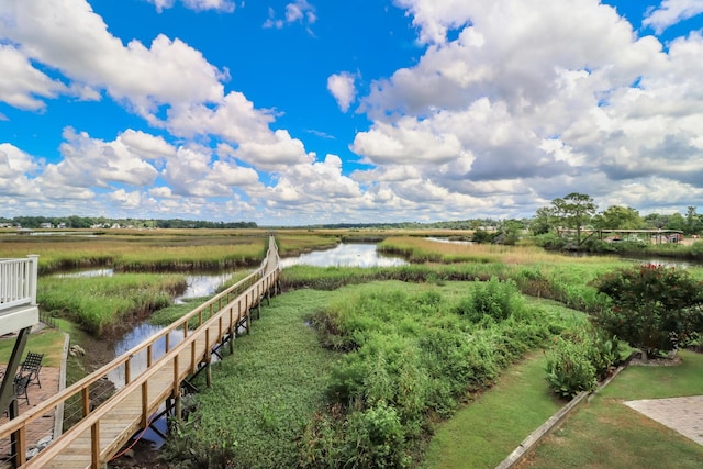 exterior space featuring a water view and a rural view