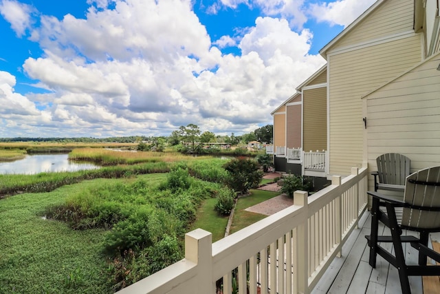 deck featuring a water view