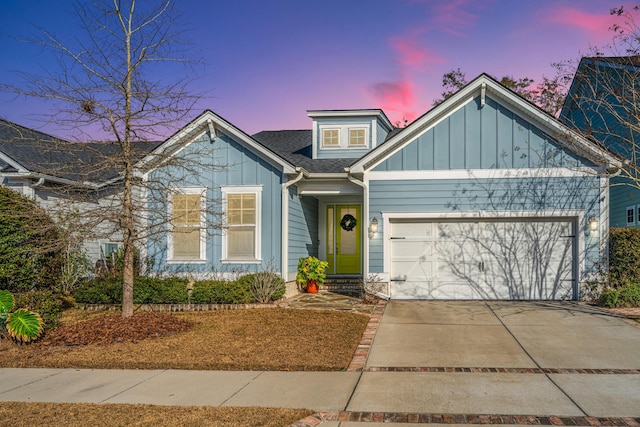 view of front of property with a garage