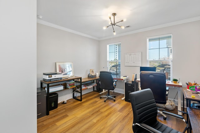 office area with an inviting chandelier, light hardwood / wood-style flooring, and ornamental molding