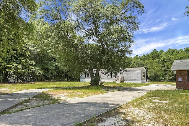 view of yard with a playground