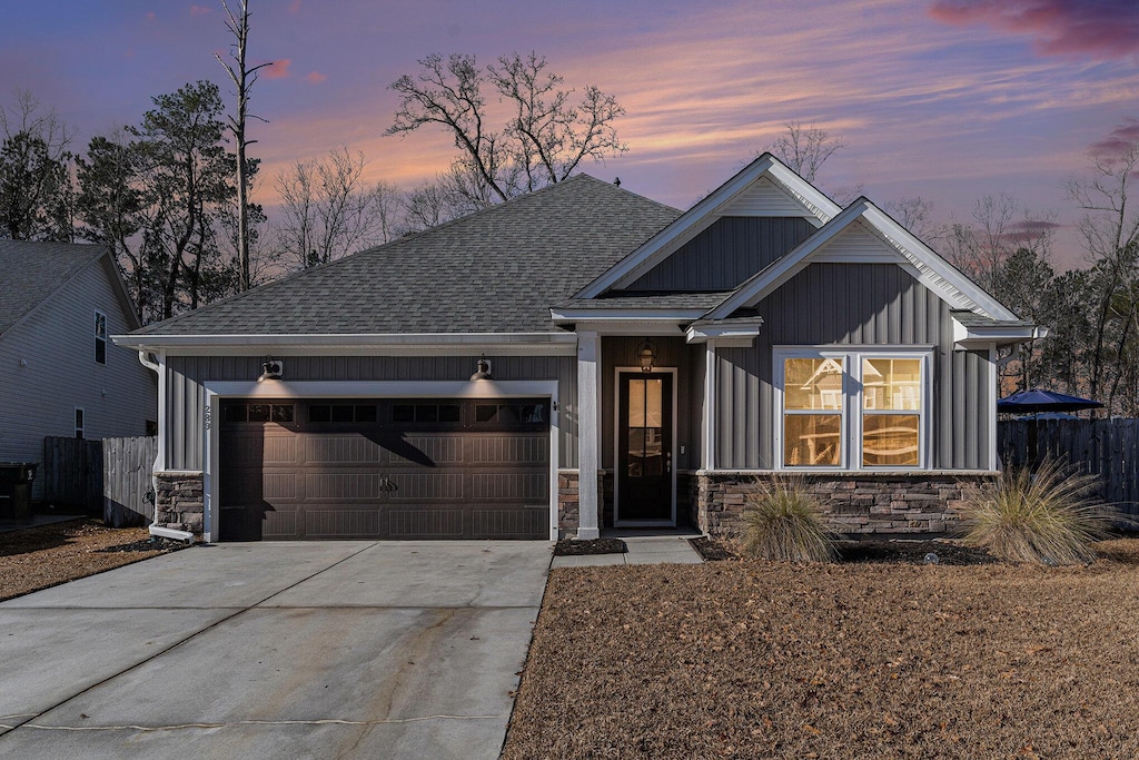 craftsman-style home featuring a garage