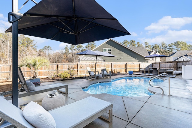 view of swimming pool featuring a patio