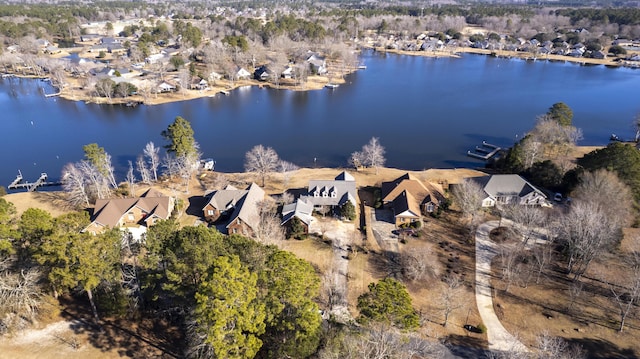 drone / aerial view with a water view