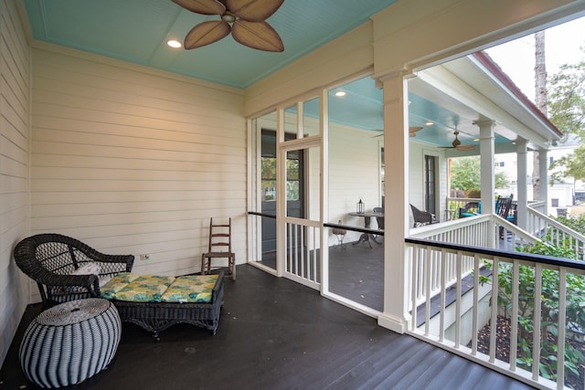 exterior space featuring a ceiling fan