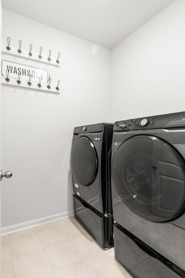 laundry room featuring washing machine and dryer