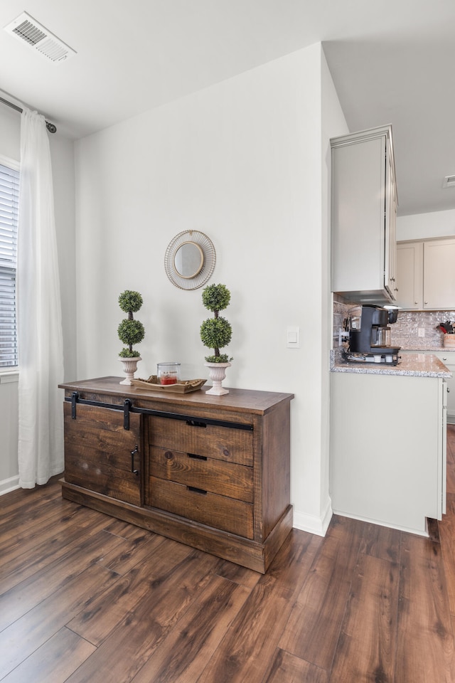 interior space featuring dark hardwood / wood-style flooring