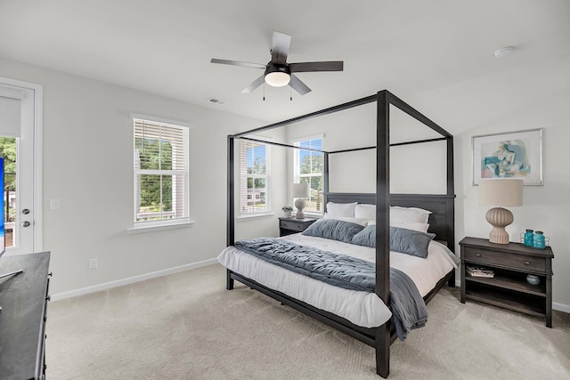bedroom with baseboards, carpet floors, and ceiling fan