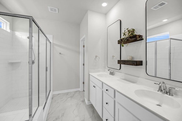 bathroom with a stall shower, healthy amount of natural light, and recessed lighting